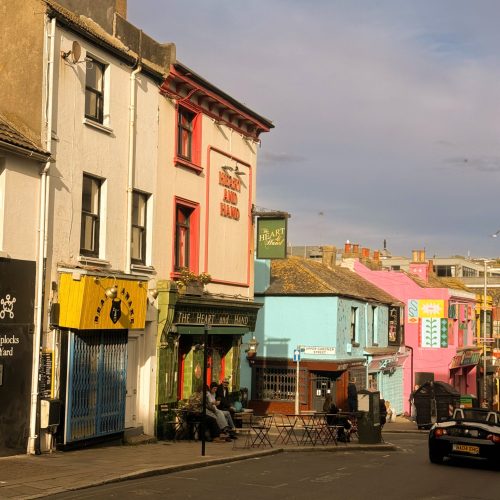 Colourful street in Brighton North Laine with traditional chimney pots, representing the new Brighton and Hove Smoke Control Area